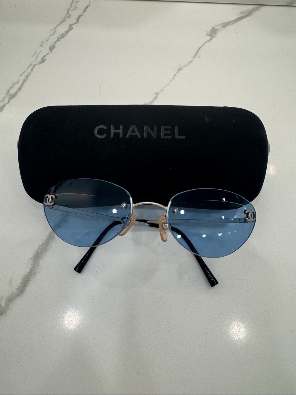 CHANEL Blue Rimless Logo Sunglasses - Women's Accessories